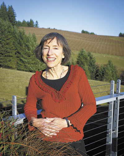 Ronni Lacroute stands on the deck of WillaKenzie’s new tasting room, which sits on carefully engineered stilts. Ronni says the property had no more flat areas on which to build. Ronni Lacroute stands on the deck of WillaKenzie’s new tasting room, which sits on carefully engineered stilts. Ronni says the property had no more flat areas on which to build.