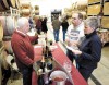 Marketing Director Buzz Kawders describes Domaine Meriwether's sparking wines to Steve and Felice Hamilton at Laurel Ridge Winery.
