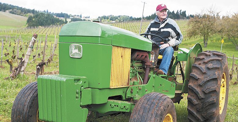 Jim Maresh does tractor work at Maresh Vineyards, which
he started planting more than four decades ago in the Worden Hill neighborhood of the Dundee Hills.##Photo by Del Munroe