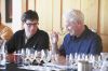 W. Blake Gray of the The Gray Report and Tyson Crowley of Crowley Wines chat at the panelists&rsquo; table during the symposium. Photo by Xilia Faye.