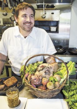 Chef/Co-owner Paul Bachand of Recipe in Newberg  sources meat and produce for the '10-Mile Dinner' hosted at his restaurant. Photo by Andrea Johnson.