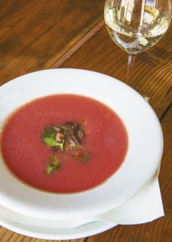 The chilled tomato soup with savory pork cracklins was inspired by a late night BLT the chef ate while tasting the Natalies's Estate 2010 Elephant Mountain Viognier. Photo by Andrea Johnson.