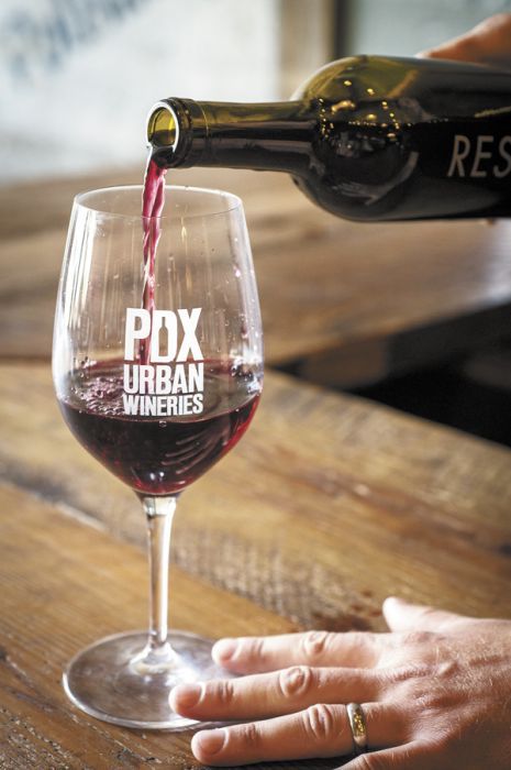 Ryan Lee Sharp of ENSO Winery in Southeast Portland pours a glass of his second label, Resonate, a blend of Mourvèdre, Cinsault and Grenache. ENSO is a proud member of PDX Urban Wineries, a relatively new association of city producers. Photo by Andrea Johnson.