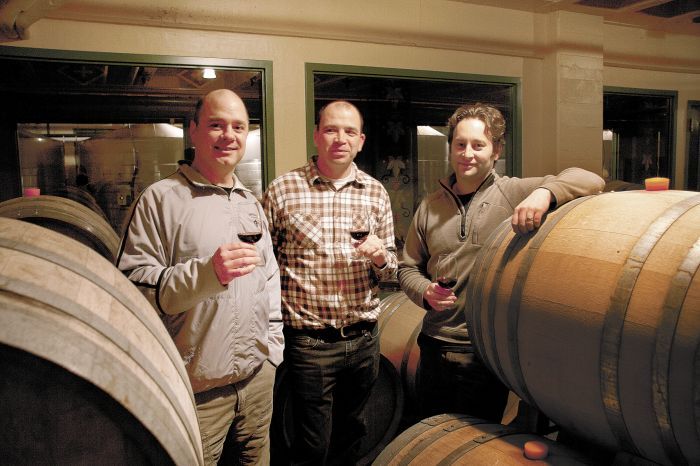 The McMenamins winemaking team (left to right): Clark McCool, director of winery and distillery operations; Davis Palmer, winemaker; and Nate Wall, assistant winemaker and enologist. Photo by Peter Szymczak.