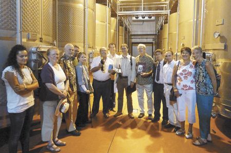 Eight people from Roseburg toured the teaching winery at San Gabriel school in Aranda de Duero in Spain to discuss a student-exchange program
with UCC viticulture, enology and Spanish-language students.
The group presented San Gabriel’s director, Jose Enrique Garcia Aguera (in lab coat), with a bottle of Abacela’s Tempranillo.