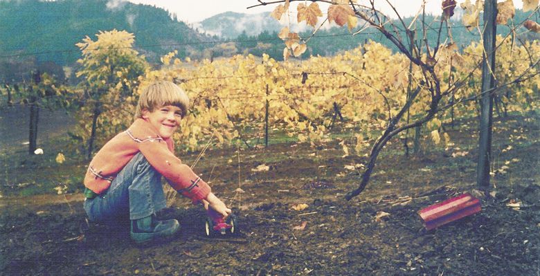 Marc Girardet as a child in the young vineyard. ##Photo provided