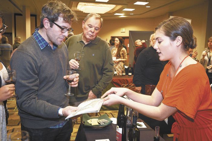 Jade Ostner pours Maryland wines at the Great American Wine Festival in Portland. Photo by Andrea Johnson.