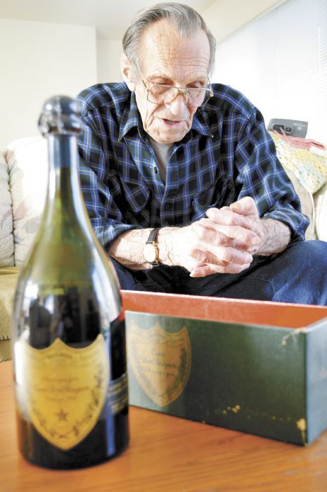 Charles Hackett, an 82-year-old retired timber worker, is the proud owner of a 1943 Dom Pérignon. Photo by Janet Eastman.