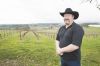 Dave Masciorini stands among the vines at Namast&eacute; Vineyard in Dallas.