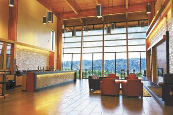The airy tasting room looks out on nearby hills and
features a sitting area and fireplace. Photos courtesy of UCC/Tristin Godsey/Creative Images