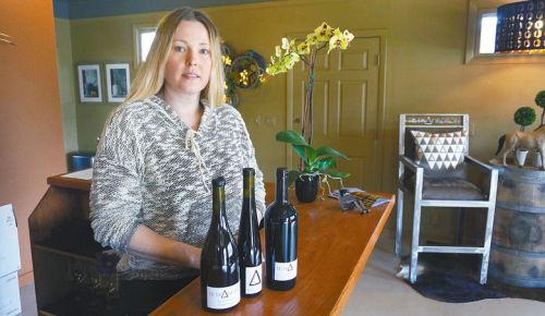 Kelly Johnson sells her wines out of Tetrahedron’s tasting room in Lyle, Washington. ##Photo by Stuart Watson.