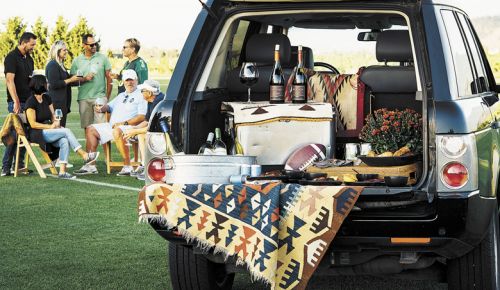 Tailgaters gather for a feast
at the regulation football
field established at Hayworth
Estate Wines near Eugene. ##Photo by Kathryn Elsesser